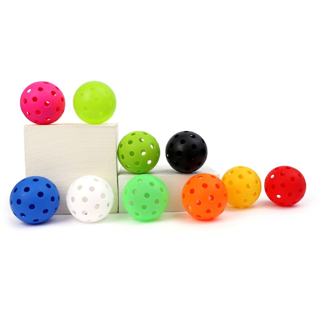 Colorful pickleball training balls with aerodynamic hole design, ideal for practice sessions and beginner skill development