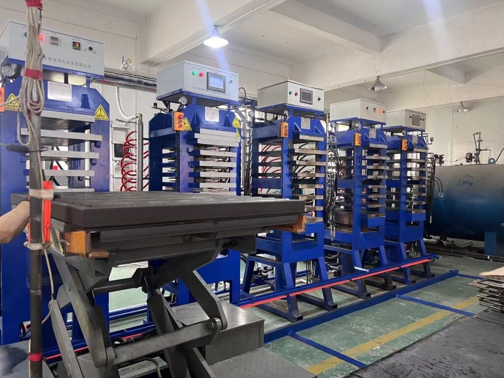 Thermoformed pickleball paddle production machines and high-temperature press line inside a professional paddle manufacturing factory
