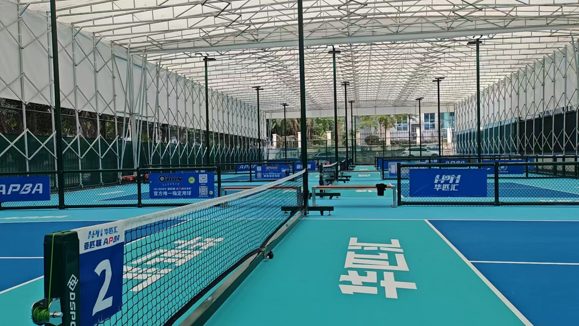 Pickleball club courts showing real gameplay, ideal environment for testing and showcasing pickleball paddles